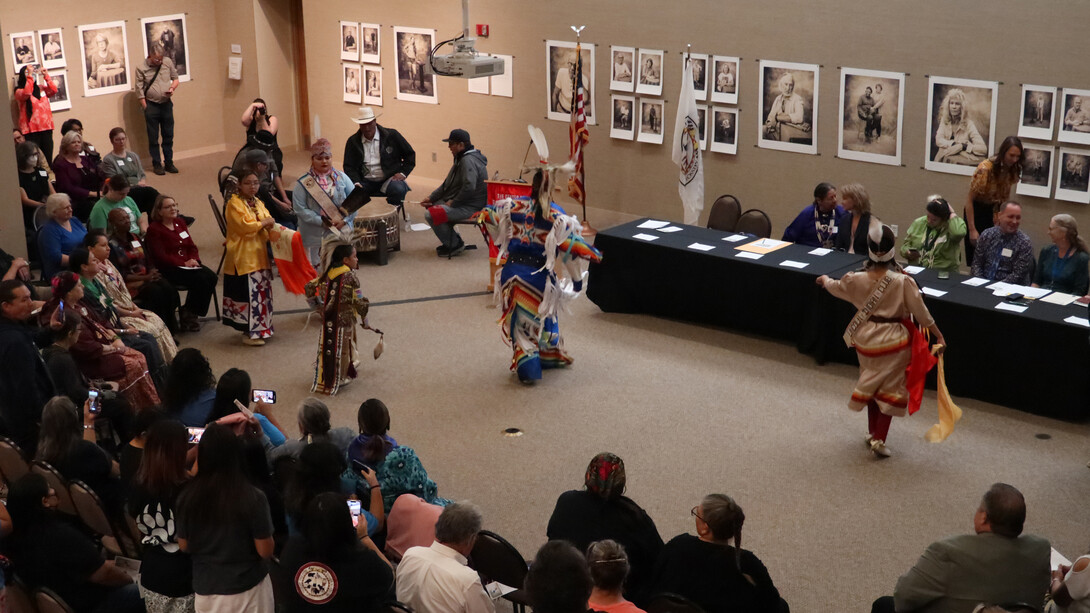 Native dancers perform before a crowd at the Center for Great Plains Studies.