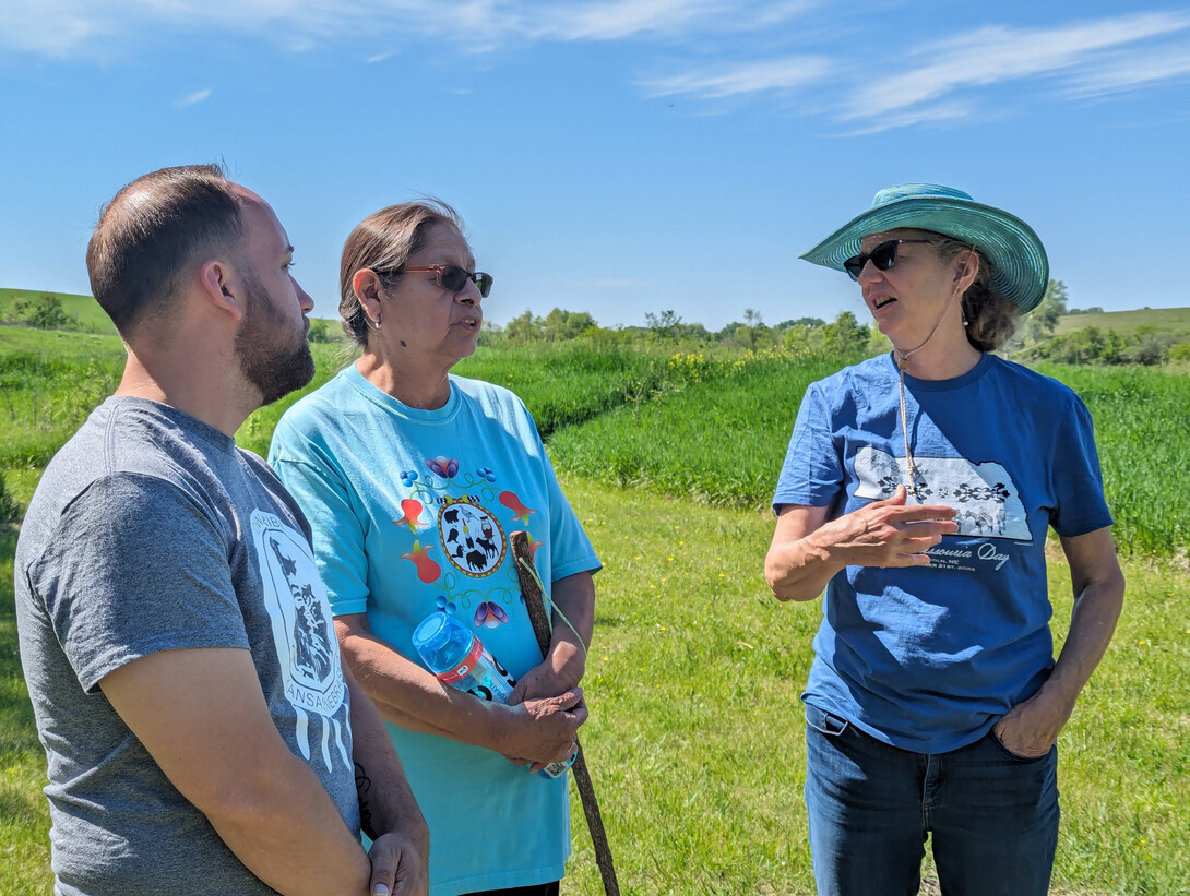 Cory DeRoin and Billie Tohee, both members of the Otoe-Missouria Tribe, speak with Margaret Jacobs, Charles Mach Professor of History and director of the Center for Great Plains Studies, at the Spring Creek Prairie Audubon Center.