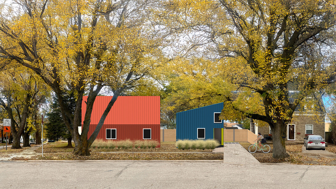 A prototype showing red and blue buildings on a residential lot.