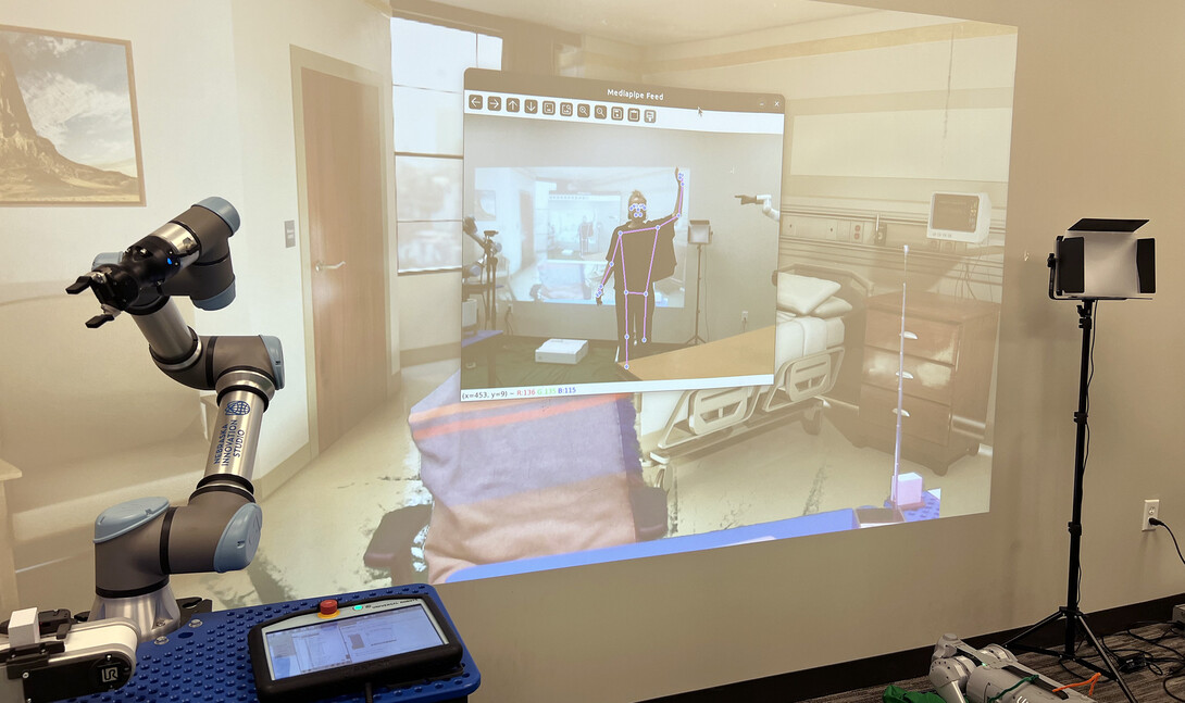 The Speculative Robotics Lab at Nebraska Innovation Campus includes a screen to help participants visualize the settings of care.