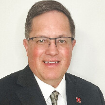 A color portrait of Eric Smith, the next director of the Nebraska Tractor Test Laboratory