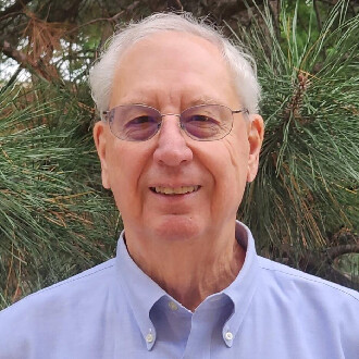 Color portrait of Wes Peterson, professor of agricultural economics at the University of Nebraska–Lincoln