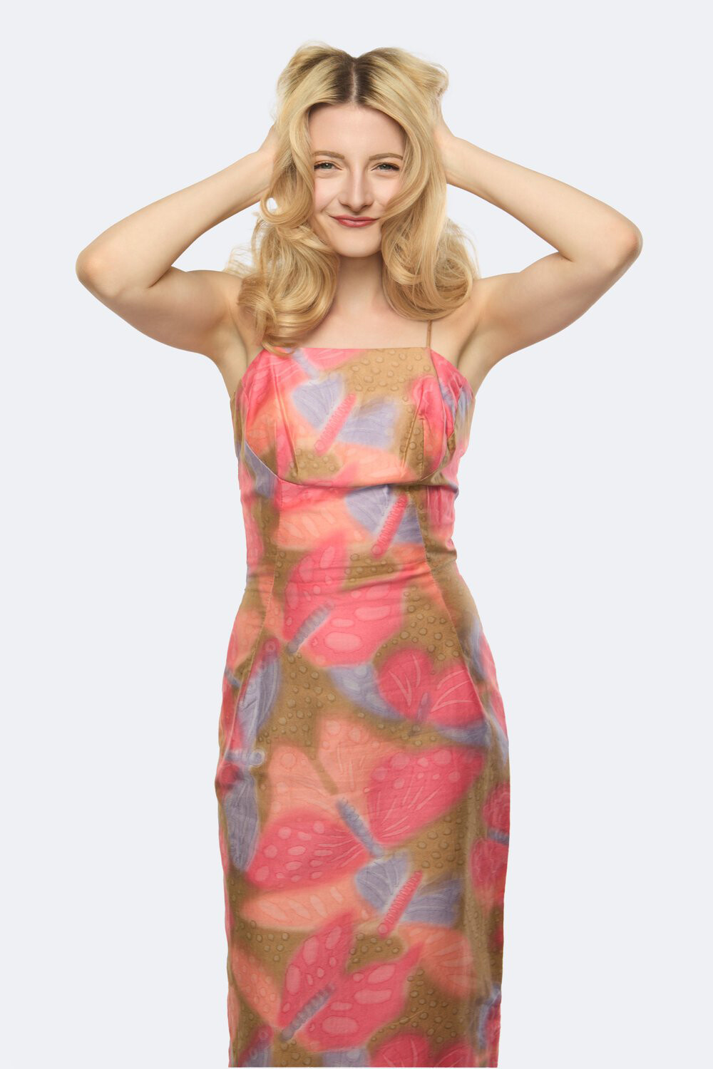 Color portrait of Caity Gyorgy, wearing a butterfly dress.