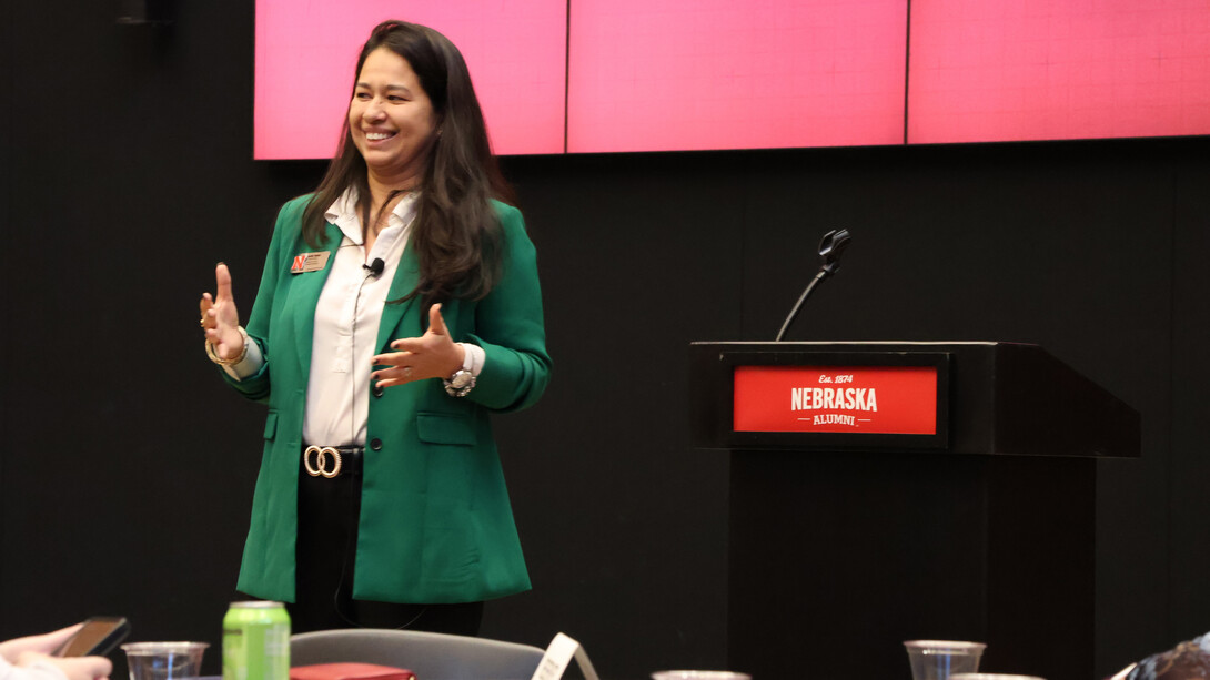 Jamilla Teixeira, assistant professor of civil and environmental engineering, speaks to a crowd.