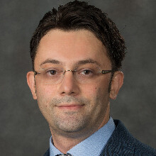 Color portrait of Erkut Sönmez, associate professor of supply chain management and analytics at the University of Nebraska–Lincoln.