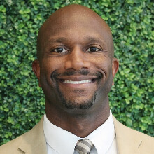 Color portrait of DeMoine Adams, motivational speaker and former Husker football student-athlete.