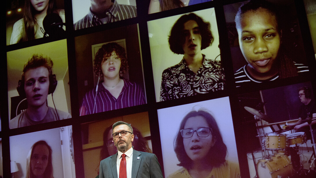 Chancellor Ronnie Green watches as a video of the UNL Jazz Singers plays at the start of the State of Our University address on Feb. 15. Learn more at https://go.unl.edu/ash7. 