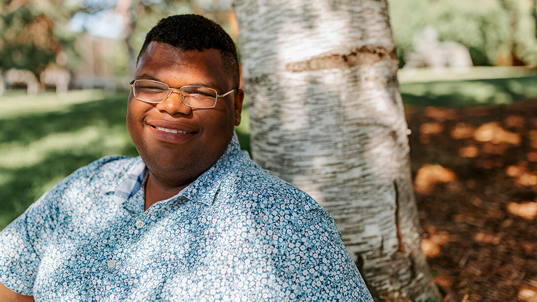 Photo of Jayven Brandt sitting outside