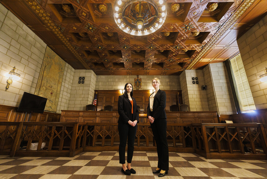 Jayden Barth (left) and Rachel Tomlinson Dick delivered oral arguments in the Nebraska Supreme Court Feb. 4. They are pictured in the Supreme Court chambers.