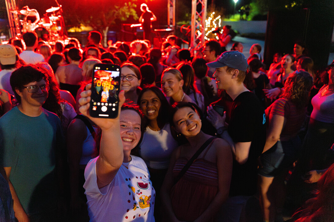 Students enjoy the free concert by Maude Latour.