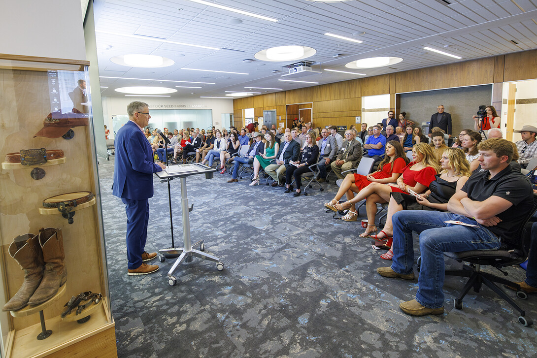 Tom Field, director of the Engler program, talks about Paul Engler during a senior celebration and awards night. Founded in 2010, the Engler Agribusiness Entrepreneurship Program is designed for graduates to return to their communities inspired to build sustainable businesses.