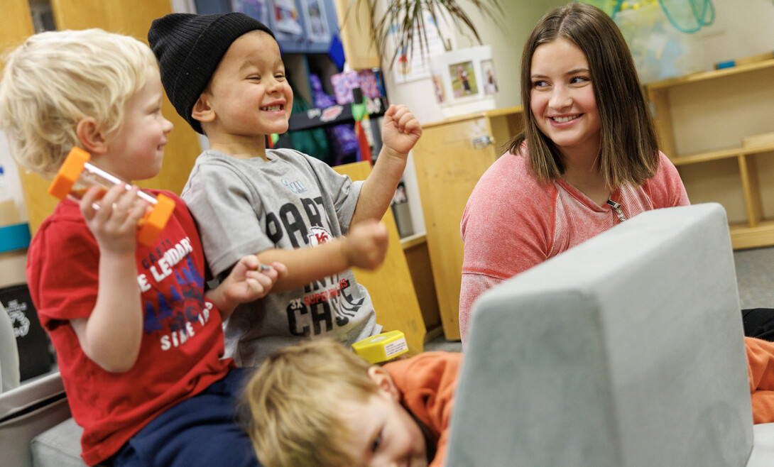 Lilly Jonas, sophomore Elementary Education & Early Child Education major, plays with children during their Student Teaching in Early Childhood Education: Preschool course inside the Ruth Staples Child Development Lab. 