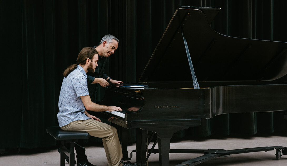 Nathaniel Brown, a senior Music major performs for Iron Barnatan, a classical pianist who is instructing a piano masterclass from the Academy of St. Martins in the Fields.