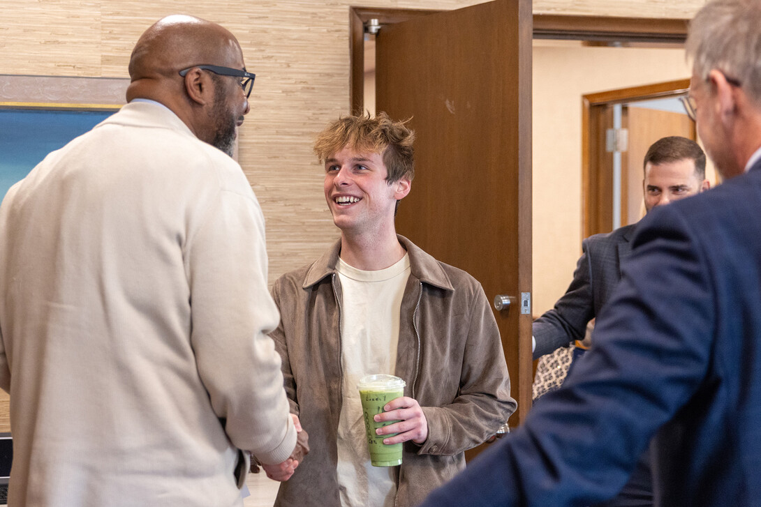 Chancellor Rodney D. Bennett greets Luke McDermott and announces that McDermott has earned a Truman Scholarship April 14, 2025.