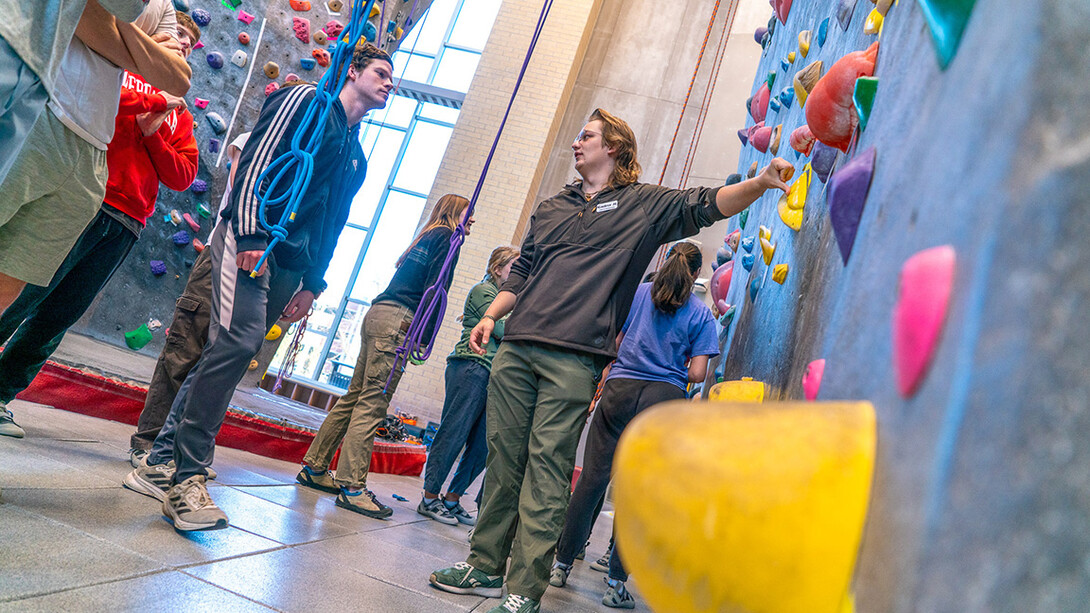 Kaden Hughes teaches Academic Indoor Climbing Class at the Outdoor Adventures Center for Huskers interested in learning the fundamentals of rock climbing.