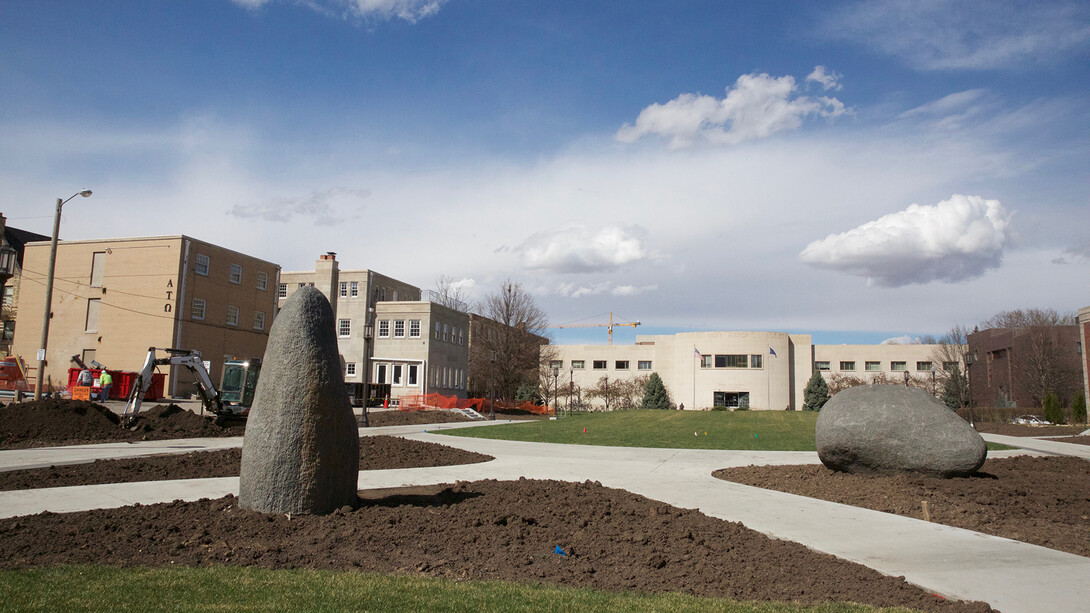 The stone sculptures (from left) “Ptah” and “Tem,” by Jene Highstein, rest on the Centennial Mall between Q and R streets. Officials from UNL and the city are discussing the addition of campus entrance columns at the north end of the mall.