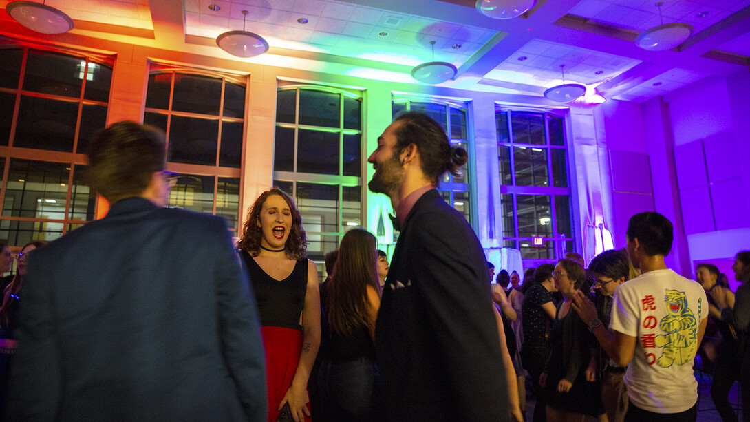 Jake Piccini (center) dances with friends during the Rainbow Ball on Oct. 4 in the Great Hall of the Kauffman Residential Center. The LGBTQA-friendly event is a new homecoming tradition at the University of Nebraska–Lincoln.