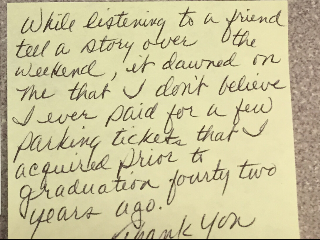 UNL alumnus Kent Broyhill sent this note along with payment for parking tickets he received during his senior year at UNL in 1974. As UNL has no record of paper tickets issued, parking and transit services returned the check Broyhill sent to pay for the 42-year-old tickets.