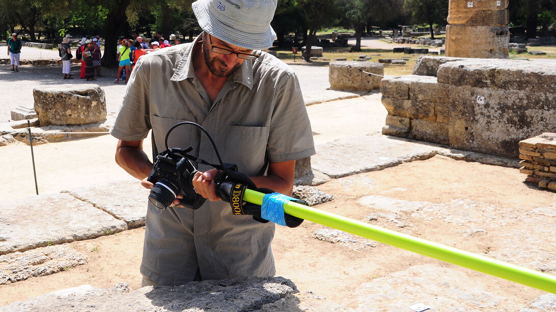 UNL's Philip Sapirstein takes digital photos of the Temple of Hera in Olympia, Greece. Sapirstein is combining digital photography with computer software to generate realistic 3-D models of ancient Greek architecture.