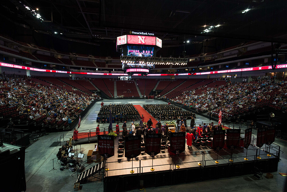 Chancellor Perlman leads the procession of deans and dignitaries to the stage to begin UNL's first undergraduate commencement in the new arena.