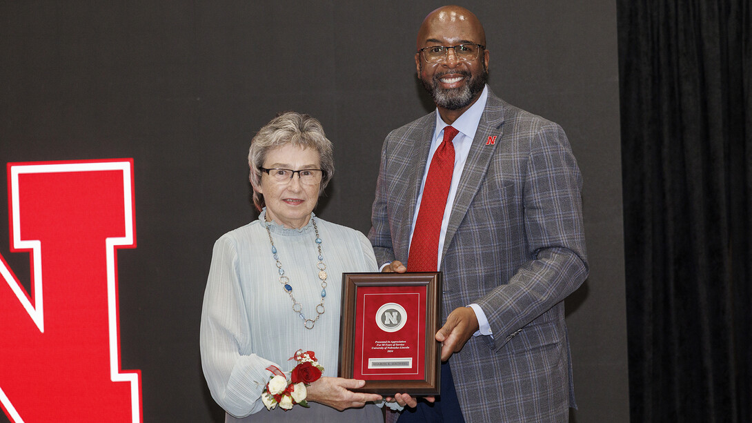 Sharon Hachtel poses with Chancellor Rodney D. Bennett after receiving her 50 year service award on Sept. 6, 2024.