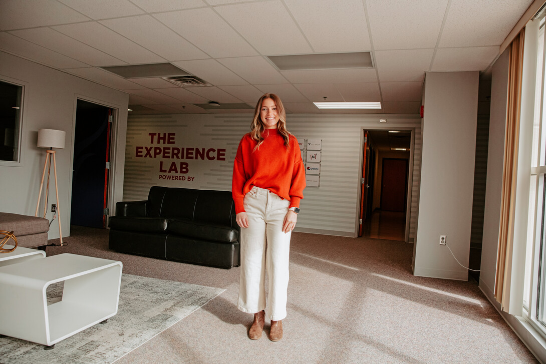 Brophy poses for a photo in the lobby of the Experience Lab, located above the Lincoln Children's Museum across the lawn from Andersen Hall.