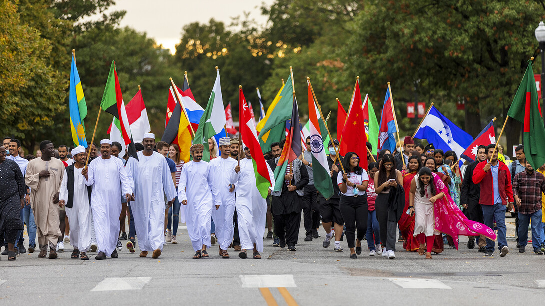 More than 100 international students carried their country’s flag at this year’s Homecoming Parade. International Education Week celebrates the multicultural diversity of the university and the opportunities available for global experiential learning.