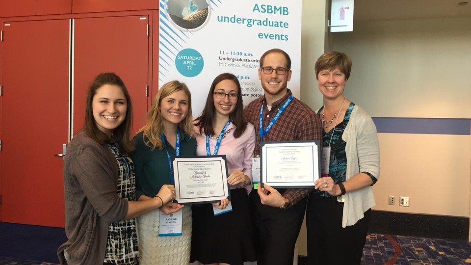 The Biochemistry Club officers and members from left: Taylor O'Brien, Erin Bertone, Jocelyn Daubendiek and Drew Egger, with Erin Sayer, chapter adviser.