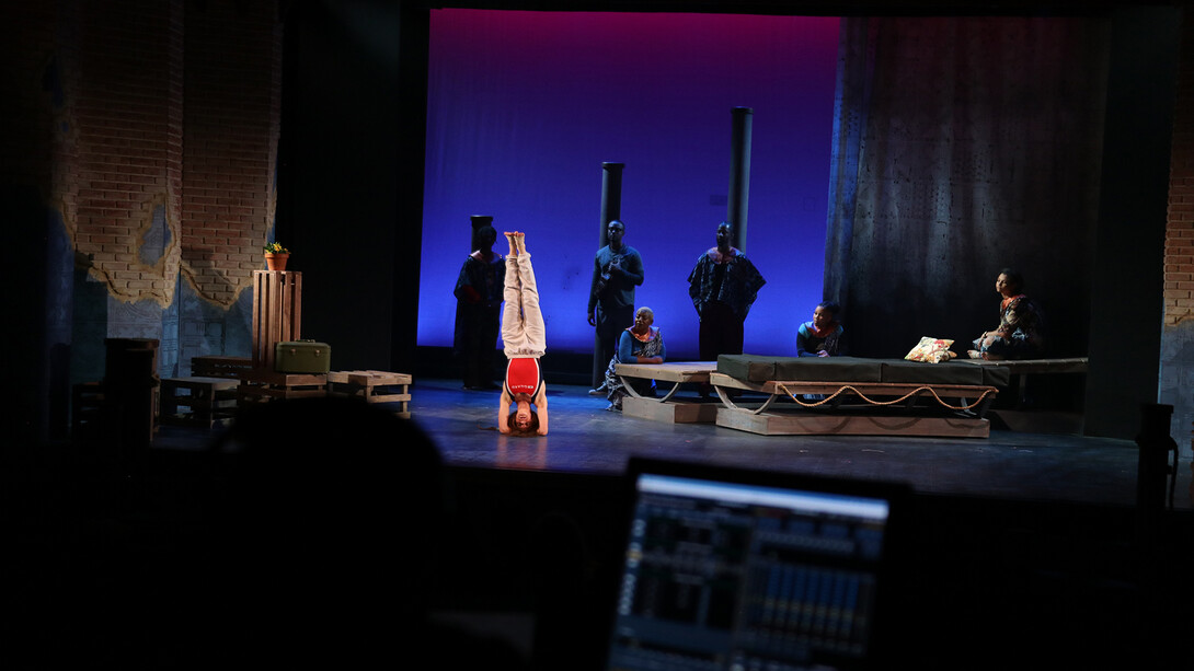 Nebraska's Claire McClannan, a senior performance major, performs upside down as Erika in the Nebraska Repertory Theatre's production of "Dontrell, Who Kissed the Sea."