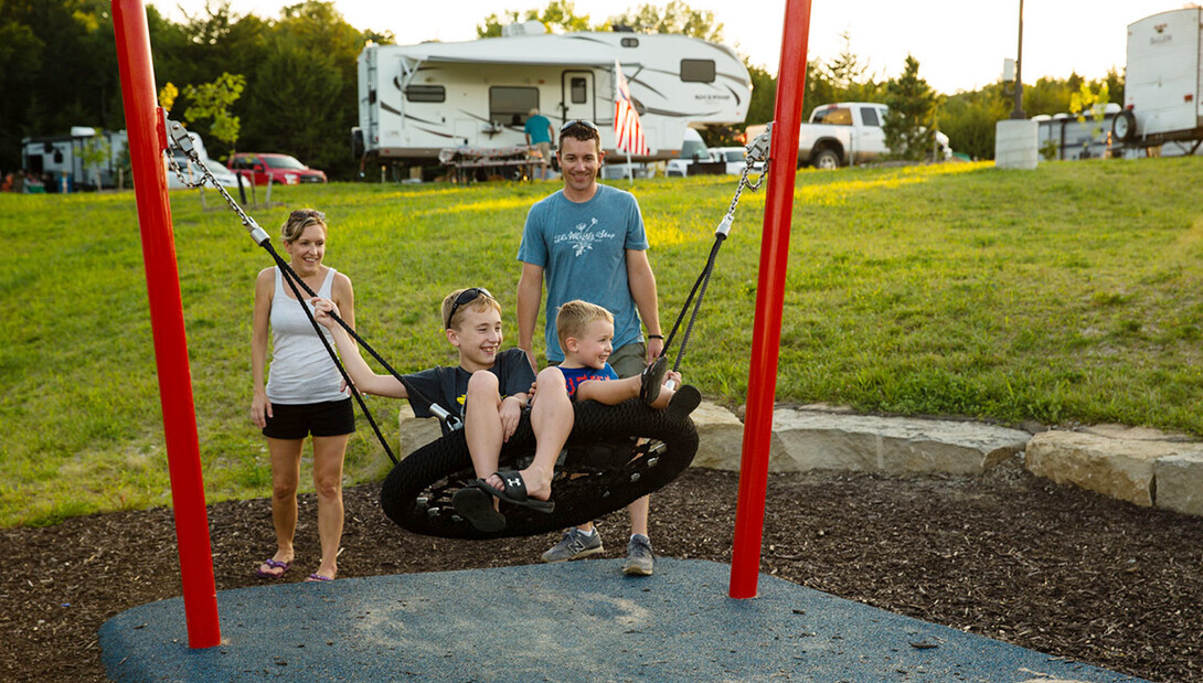 Emily and Doug Schmitz and their sons play at Platte River State Park.