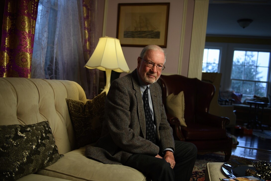 John Roy Price is pictured in his home.