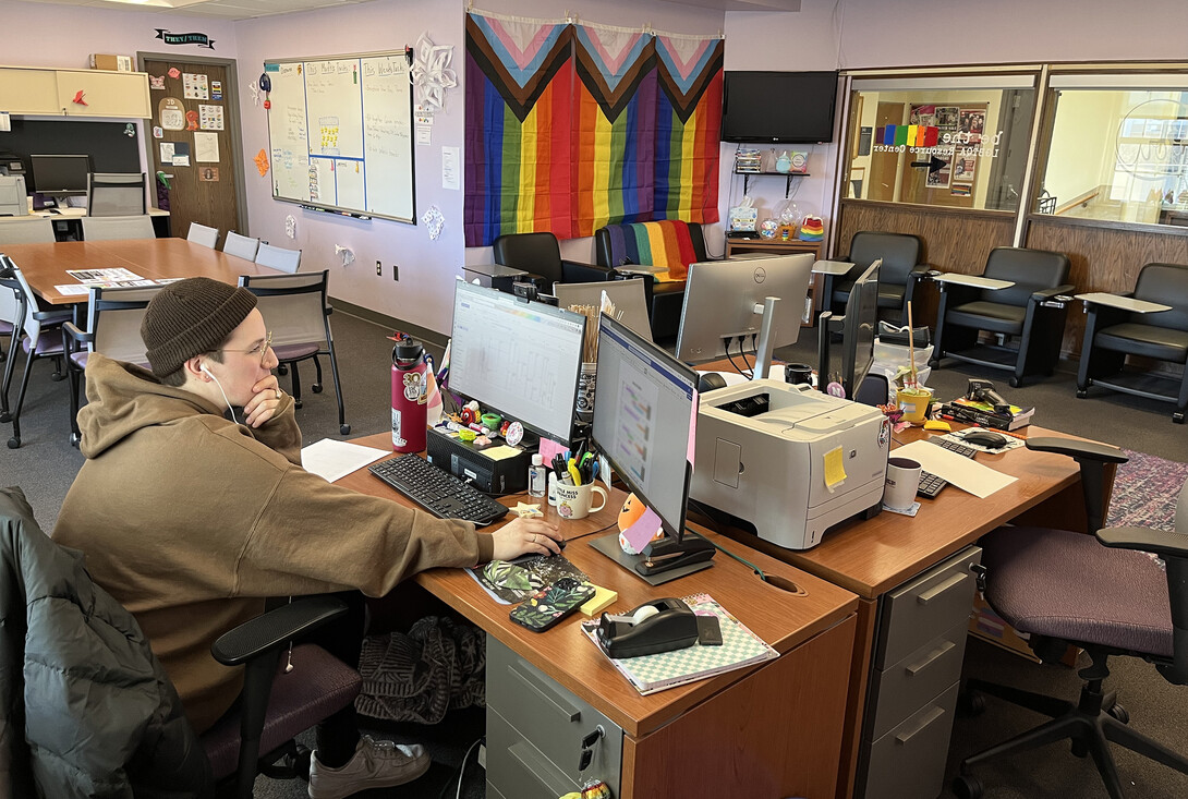 Ash Turner, graduate assistant, works in the LGBTQA+ Center Jan. 31, 2023.