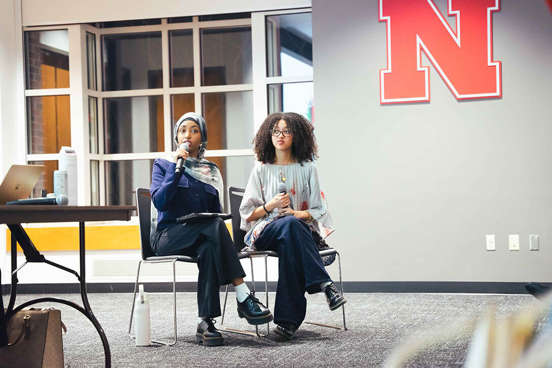 African Student Association President Hamdiya Mumade and ASA Secretary Lali Regassa ask the NSA panel questions about the future of the organization in the Heritage Room at the Nebraska Union.