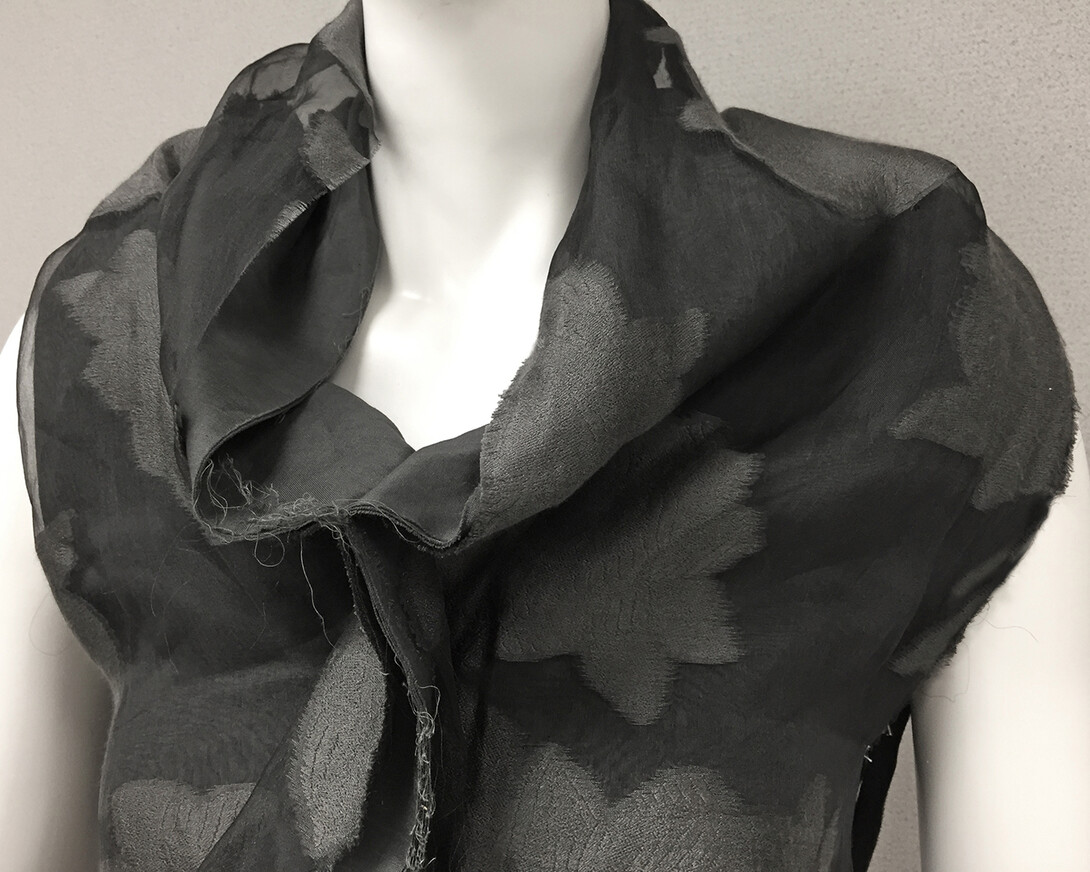 Gray deconstructed cowl neck dress, c. 2000 Label: Comme des Garcons, Designer: Rei Kawakubo. Departmental purchase from the estate of Mary Wangsness of Minneapolis, Minnesota, 2011.001.035