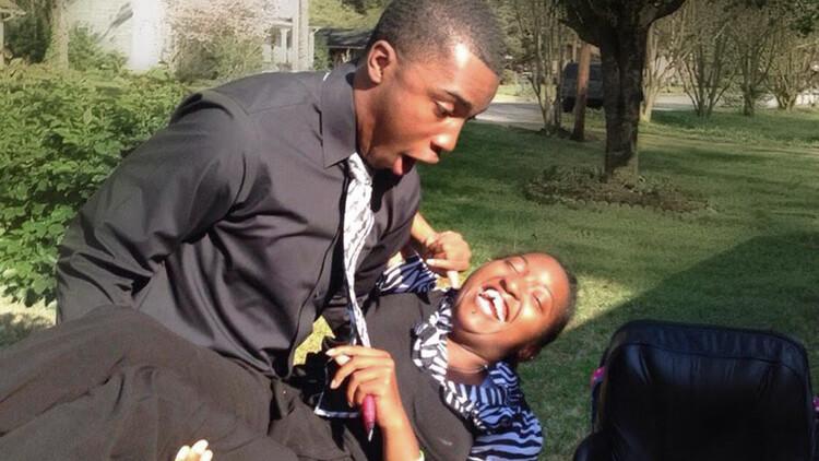 Amori Strong (right) jokes around with her brother, De'Mikyle Holmes. Strong will graduate in August with a bachelor's degree after majoring in psychology. The siblings have not seen each other in five years and hope to celebrate during Nebraska's August commencement exercise.