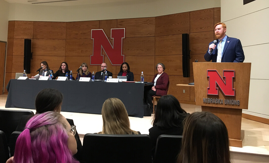 Tyler White, assistant professor of political science and interim director of the National Security Studies program, introduces the panel of intelligence officials who spoke to students at the Women in National Security Symposium Feb. 22.