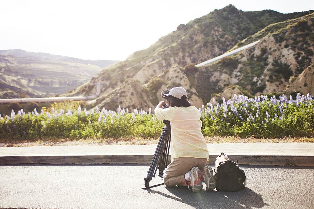 Director Ann Kaneko films the Los Angeles Aqueduct at sunset.