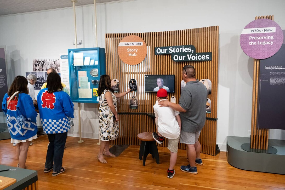 Visitors at the Japanese Hall during the grand opening, June 2024. Photograph by Anthony Essau, Upland Exhibits.