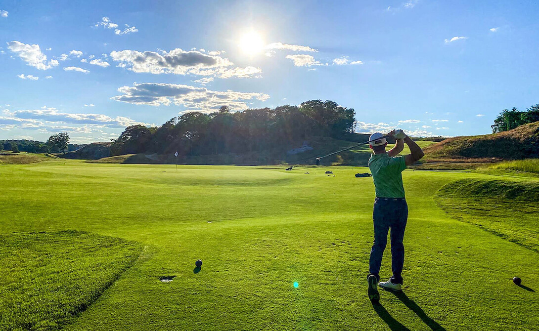 Blare Bauer tees off on the 17th hole at Essex County Club in Manchester, Massachusetts. 