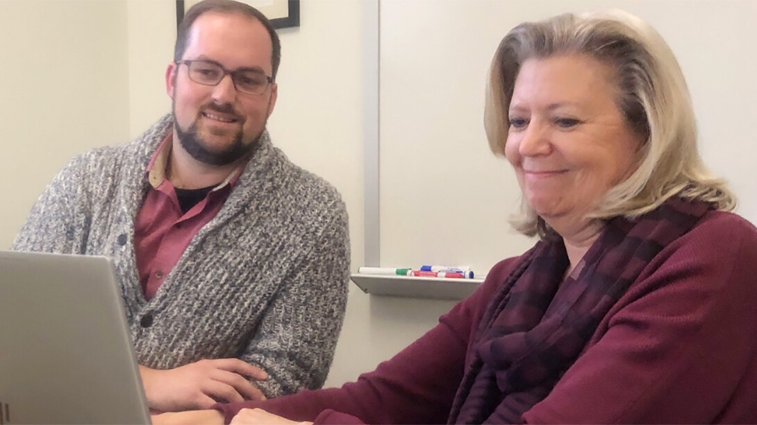 Steven Cain (left) works with an instructor during a one-on-one consultation. 