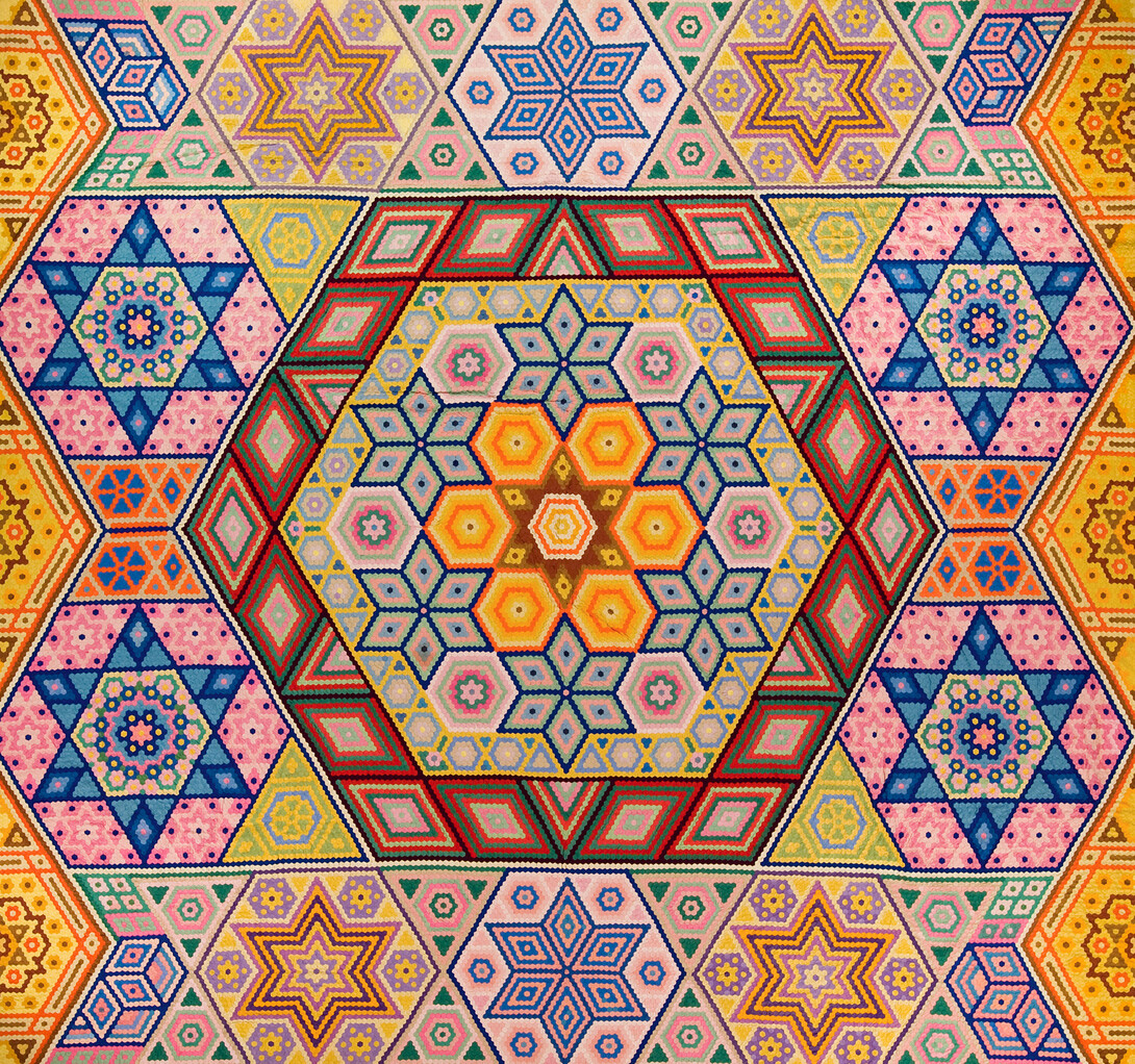 Grace Snyder's "Hexagon Mosaic" quilt, one of her two designs designated among the 100 best 20th-century quilts by Quilters Newsletter Magazine in 1999. She made the quilt in 1940. (Image No. 2009.032.0001)