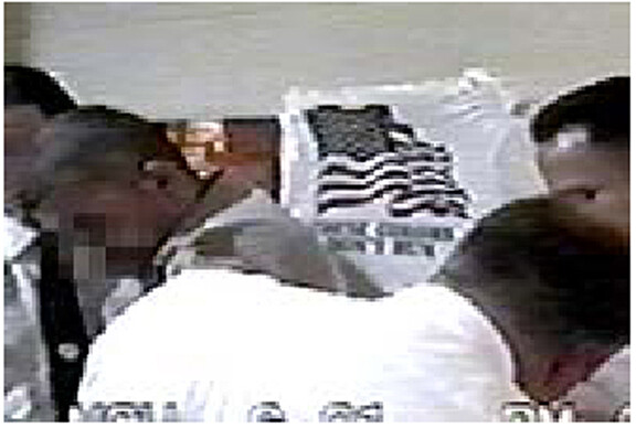 A still from Jenny Polak and Dread Scott’s 2004 video collaboration “Welcome to America,” which explores brutality against immigrants in U.S. detention after Sept. 11, 2001.