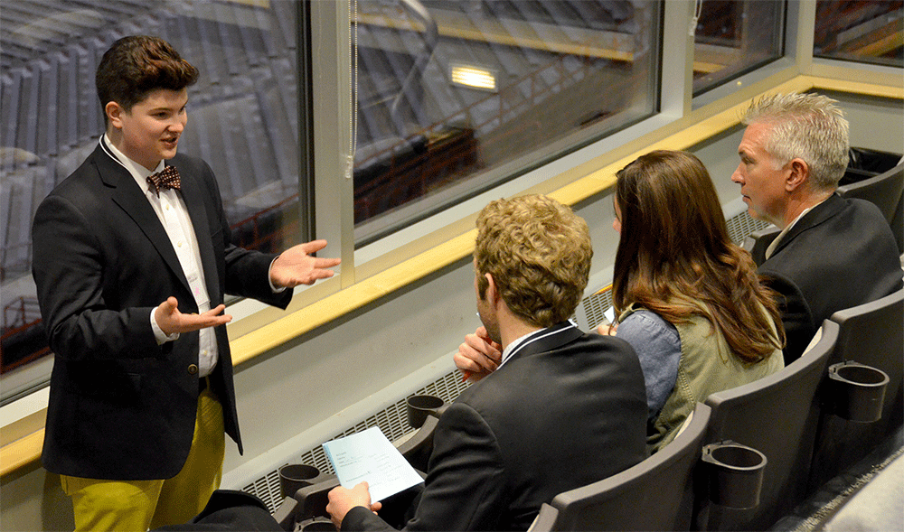 Sam Meier, a junior management and marketing major from Heartland, Wis., pitches his business idea for TattooMi at the 3-2-1 Quick Pitch competition on Nov. 21, 2013.