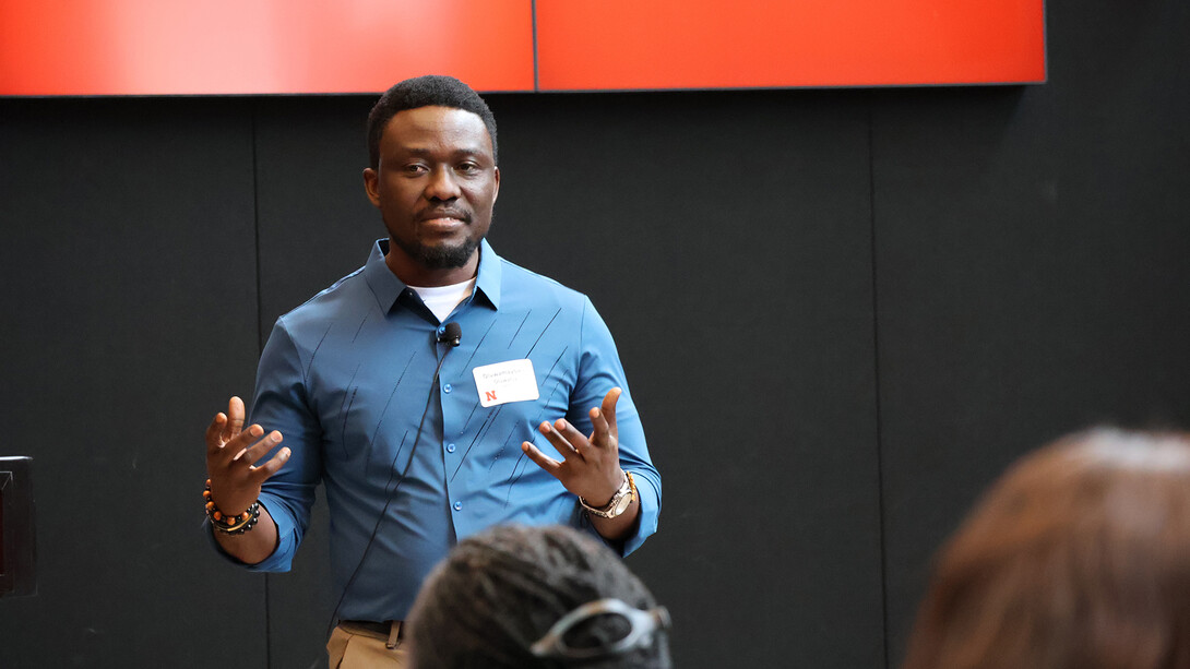 Oluwamayowa Oluwaniyi, a graduate student in mechanical and materials engineering, speaks on stage during the Student Research Days Slam at the University of Nebraska–Lincoln on April 9.
